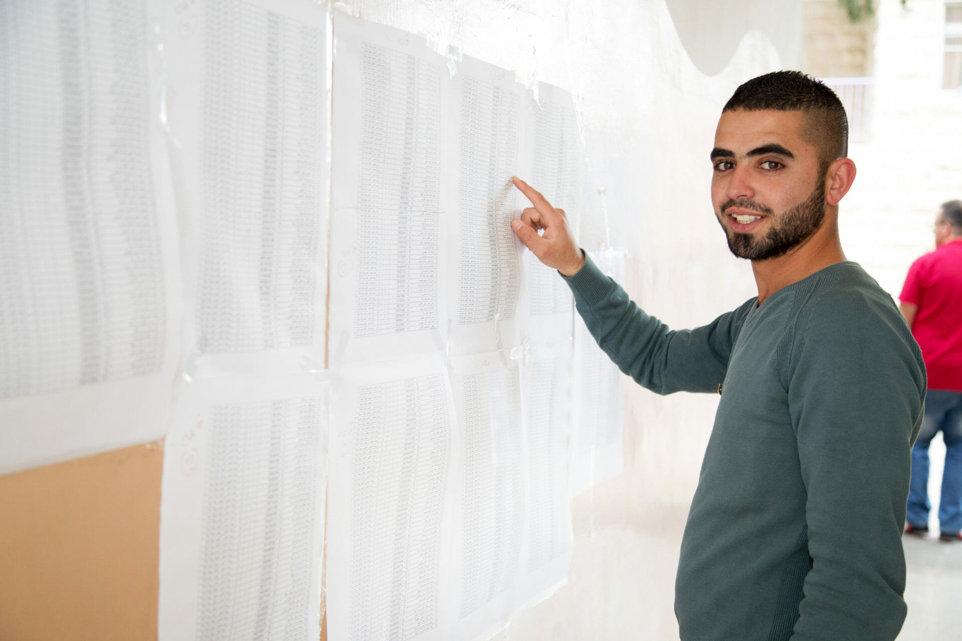 young man checking results